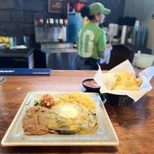 Flat Enchiladas with green chili, rice &amp; beans.