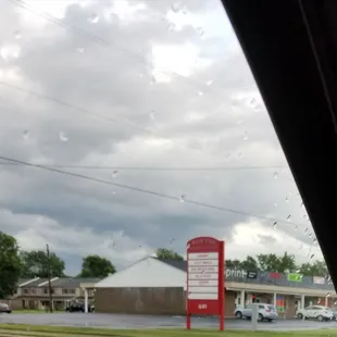 Green Chili Strip Mall location with sign