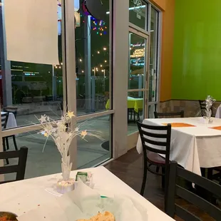 An empty table - waiting for you. Have a samosa. Tell em I sent ya.