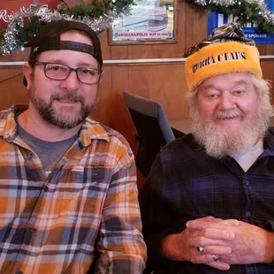 two men sitting at a table