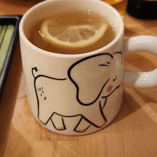 Hot ginger drink with honey lemon and lime