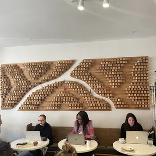 a group of people in a coffee shop