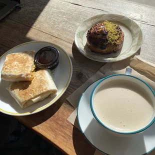 Breakfast burrito, pistachio danish thing, oat milk chai latte