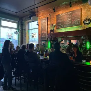 people sitting at a bar