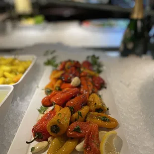 a long platter of peppers