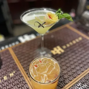 two cocktails on a table