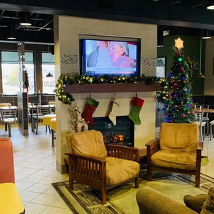 a christmas tree and fireplace