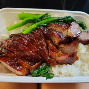 pork and rice in a styrofoam container