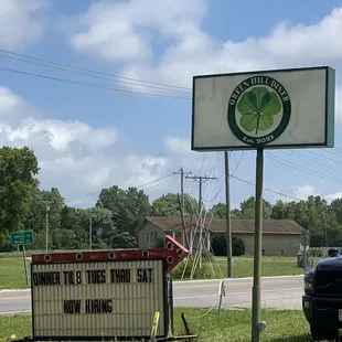 a sign and a car