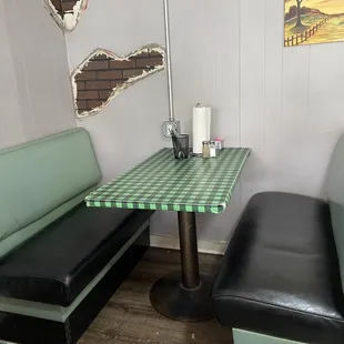 Adorable vintage green vinyl booths.