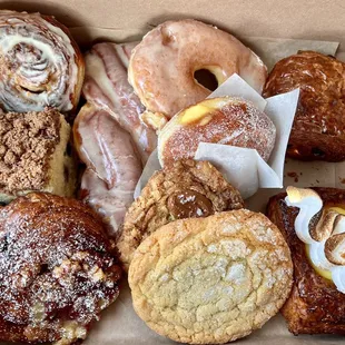 a variety of pastries in a box