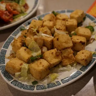 a plate of fried tofu