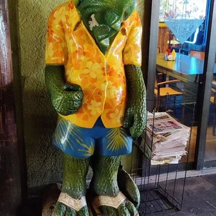 a green iguana statue