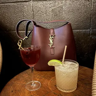 a purse and a drink