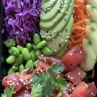 Ahi tuna poke bowl. Comes with a spicy soy sauce &amp; creamy wasabi sauce on the side.