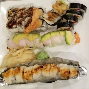 Shrimp Tempura Roll, Spider Roll, Baked Scallop Roll and 14th Year Roll for a cost of $46.90, which I felt was high.