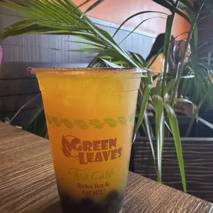Mango green tea with boba