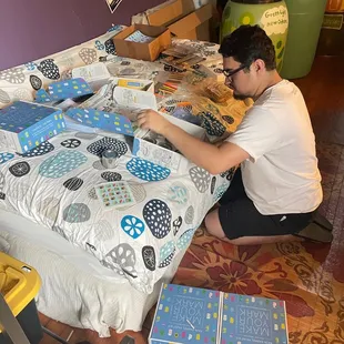 assembling school boxes for classroom barrel painting.