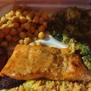 Salmon over yellow rice curried garbanzo beans and teriyaki broccoli deeeliciousness‼