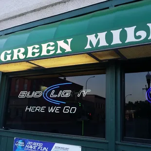 a neon sign in the window