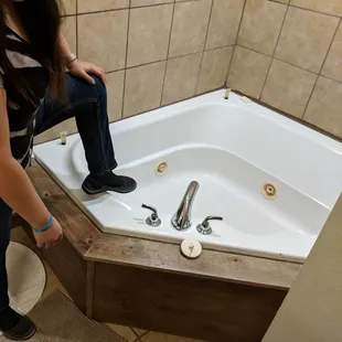 Very tall &amp; VERY hard to get in/out for shower/bath for elderly or anyone with physical ailments.