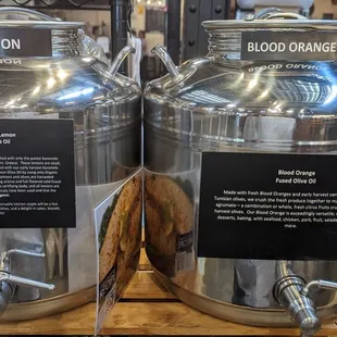 two large stainless steel jugs