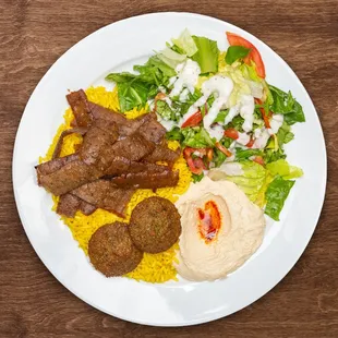 a plate of food on a wooden table