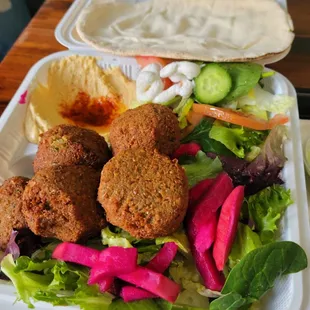 Falafel plate, salad, hummus, pita  pickled beets