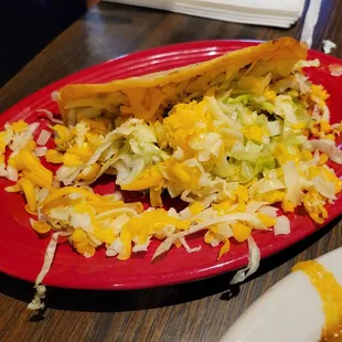 Shredded beef taco was delicious and had generous dimensions, part of a combination plate with a tostada.