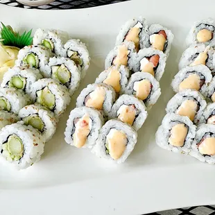 a plate of sushi rolls