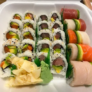 To Go Order, Salmon and avocado roll, Tuna and avocado roll and Rainbow specialty Roll.