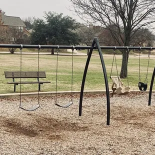 Swings: 2 regular swings, 1 therapeutic/intermediate swing, and 1 bucket swing.