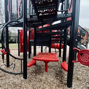 Green Park -- the larger of the playground structures (fire truck theme)/ integrated picnic table and climbing option