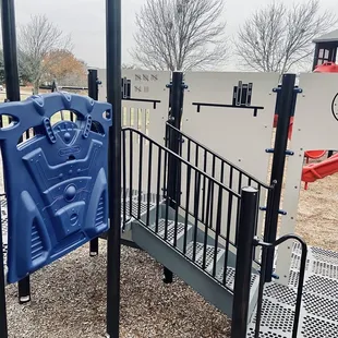 View of the reverse side of the smaller playground (police station theme)
