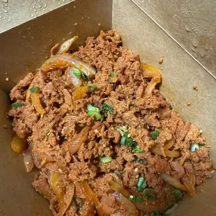 Spicy pork. Taste good but the meat cut is different from the photo on uber eats. See next one for the displayed photo.