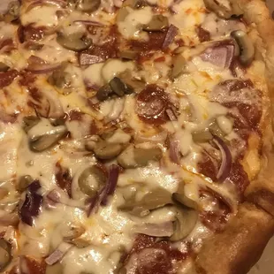 Nasty Pizza. Cheese barely melted, no sauce, canned mushrooms
