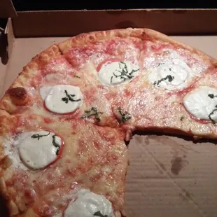 Very light on toppings for a specialty pizza and paying a premium.