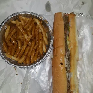 Shrimp cheese steak sub with gravy fries definitely a five star on point delicious