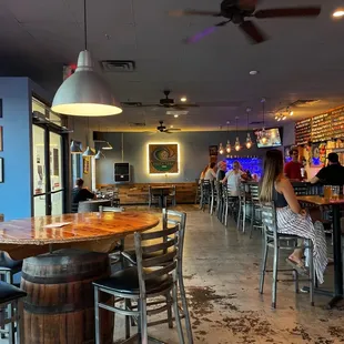a woman sitting at a bar