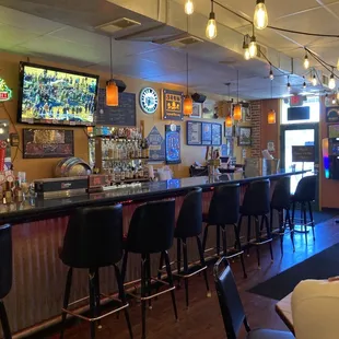 a bar with bar stools