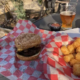 Delicious daily burger on a beautiful patio day!  Burger: Triple B, with tots and a Papa Louie&apos;s Old Country Promise.