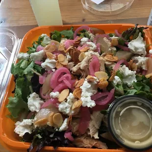 a salad in a plastic container
