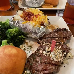 New York Strip w/ blue cheese crumbles, broccoli, and loaded baked potato
