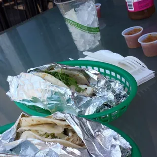2 chicken tacos, 1 Mahi Mahi and 1 veggie. And the sauce are medium and got with a raspberry sweet tea to wash it all down.