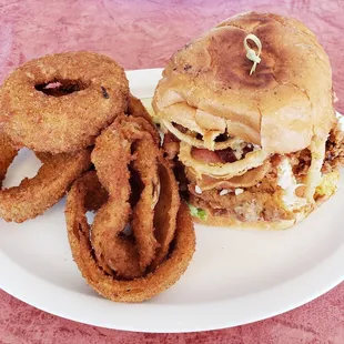 Fried Buffalo Chicken sandwich with large tasty onion rings
