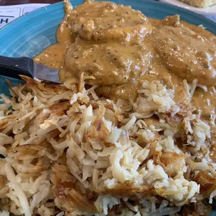 Darlas sausage gravy, the best!!!  This came on biscuits but get the "Lola" option and substitute the biscuits for cornbread!  So amazing!