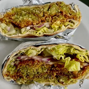 Falafel (home made by the family) pita sandwich with Siracha, no tomatoes or tahini sauce.  I already ordered it twice this week