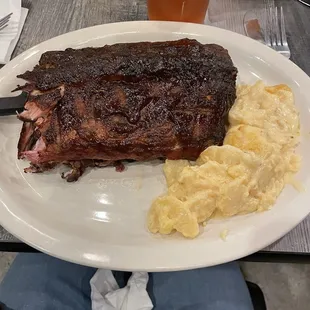 Half rack of ribs and  potatoes