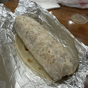 Chorizo Breakfast Burrito ! Comes with potato and cheese. Super bomb, perfectly tucked.