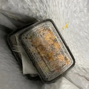 a piece of bread in a plastic container